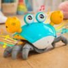 Krab-uciekajacy-pelzajacy-czujnik-interaktywna-akumulator-USB-zielony-183830 Interaktyvus ropojantis krabukas su garsu ir USB įkrovimu